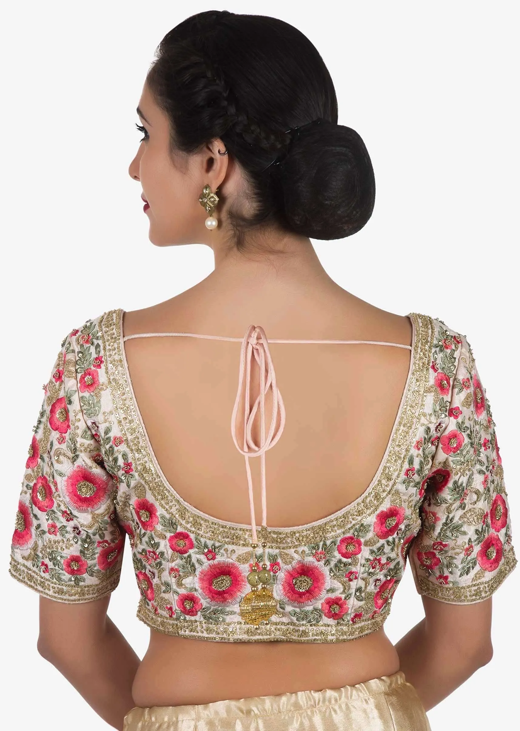 Baby pink saree in net with a ready raw silk blouse beautified in resham work only on Kalki