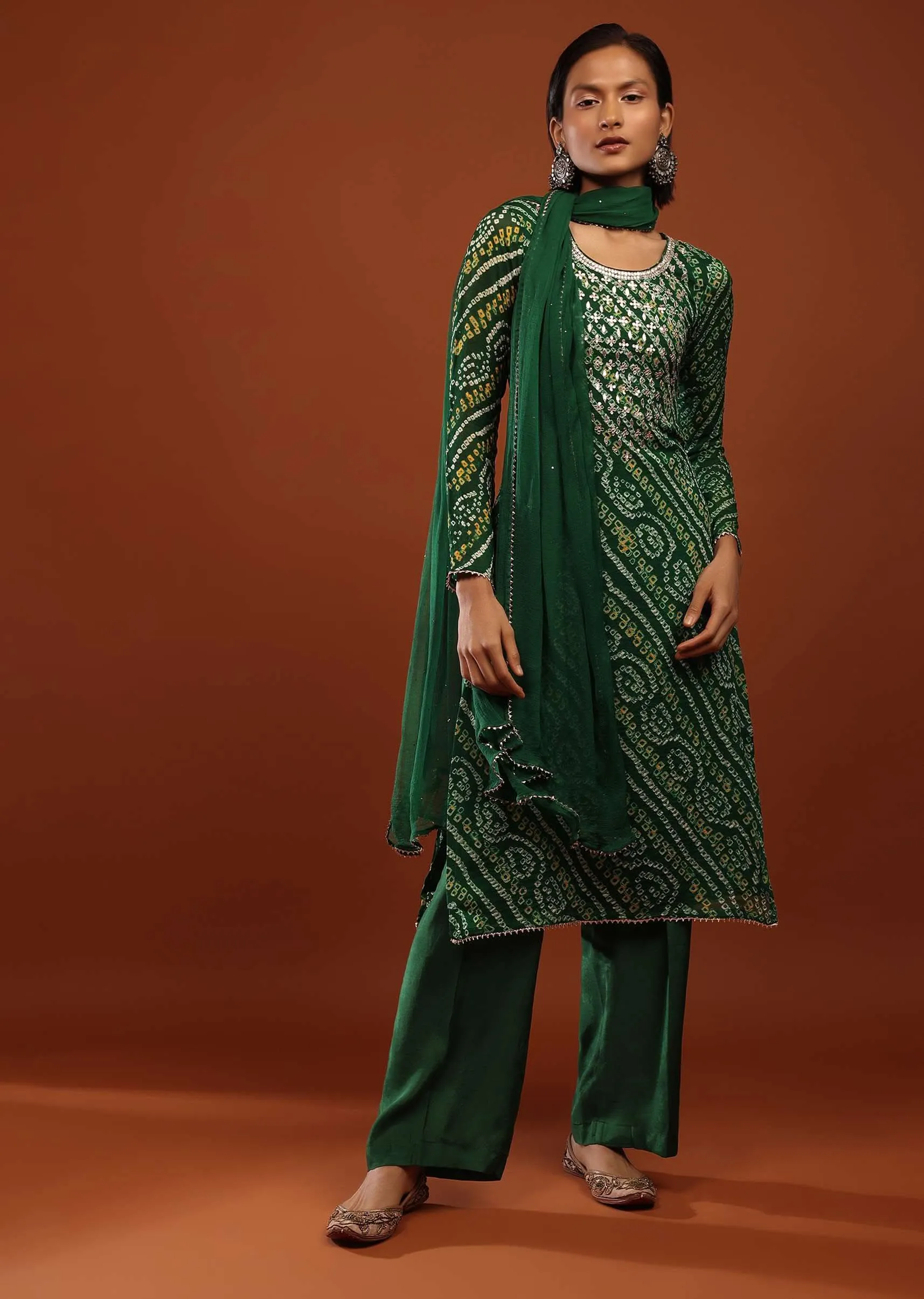 Bottle Green Straight Cut Suit In Georgette With Bandhani Print And Gotta Embroidered Yoke