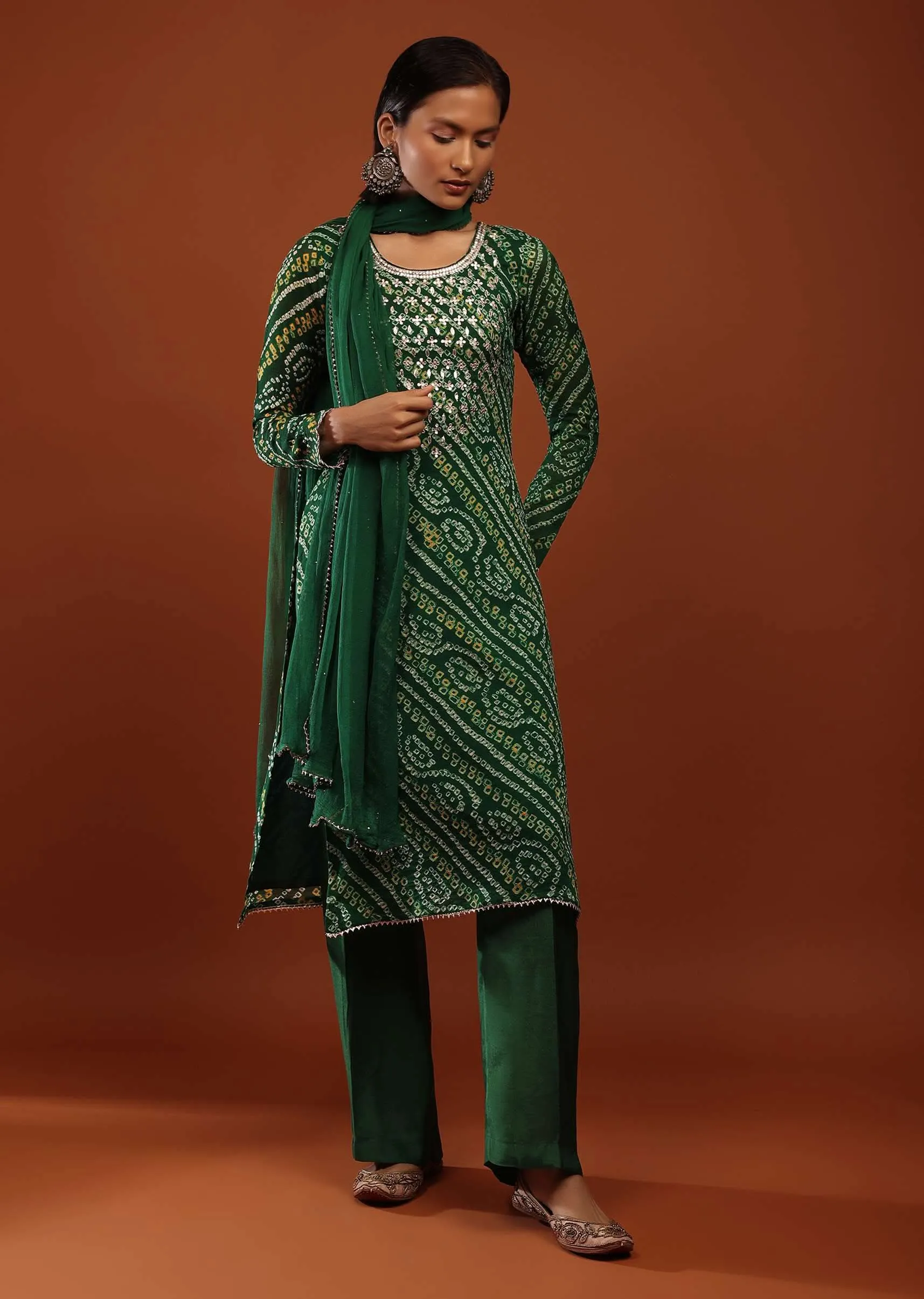 Bottle Green Straight Cut Suit In Georgette With Bandhani Print And Gotta Embroidered Yoke