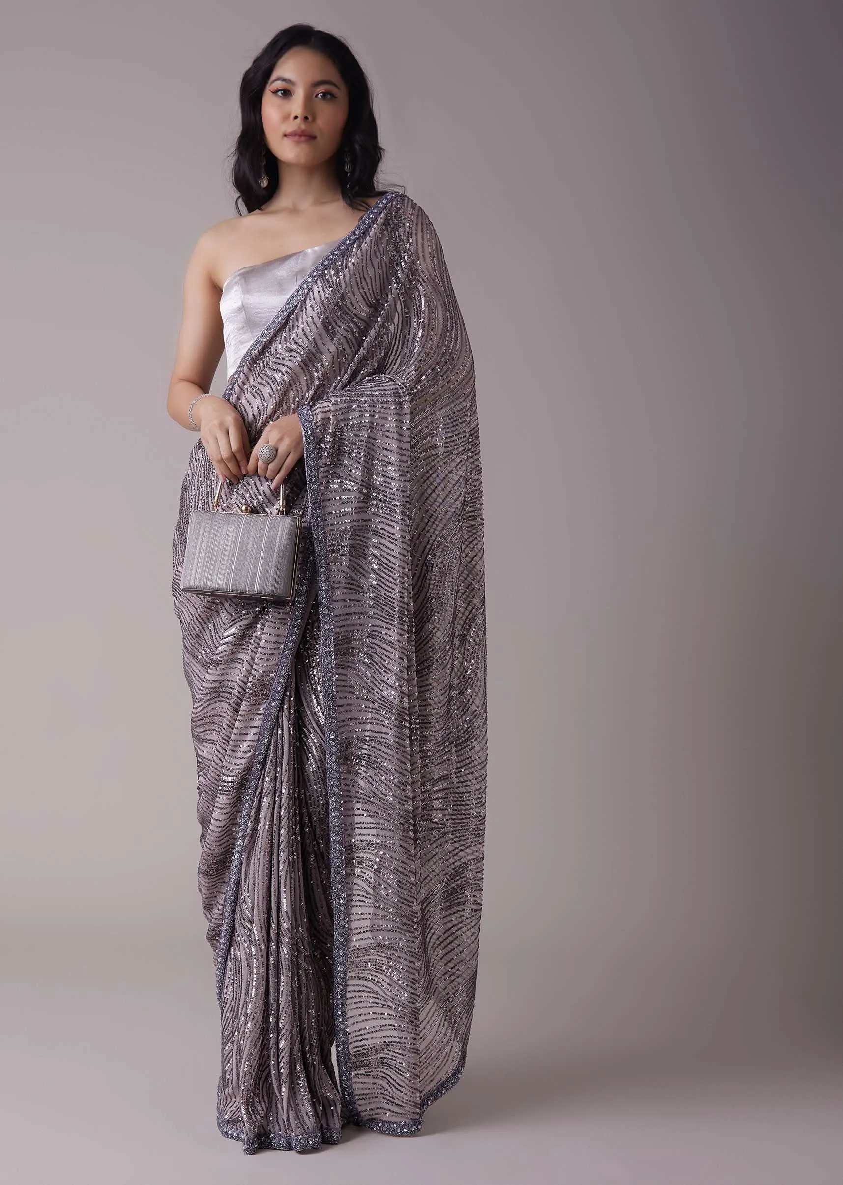 Lavender Purple Sequins Saree With An Embellished Border
