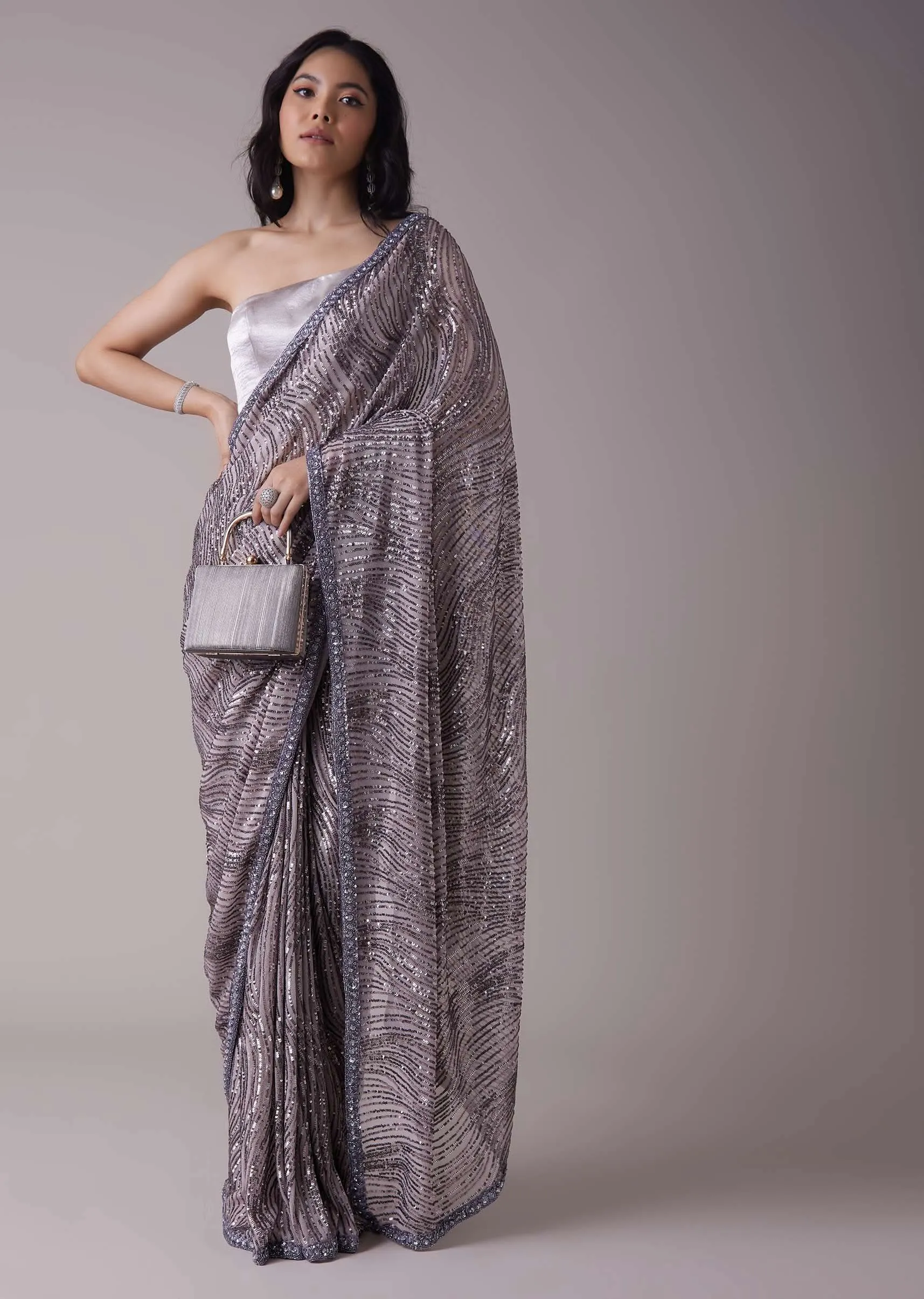 Lavender Purple Sequins Saree With An Embellished Border