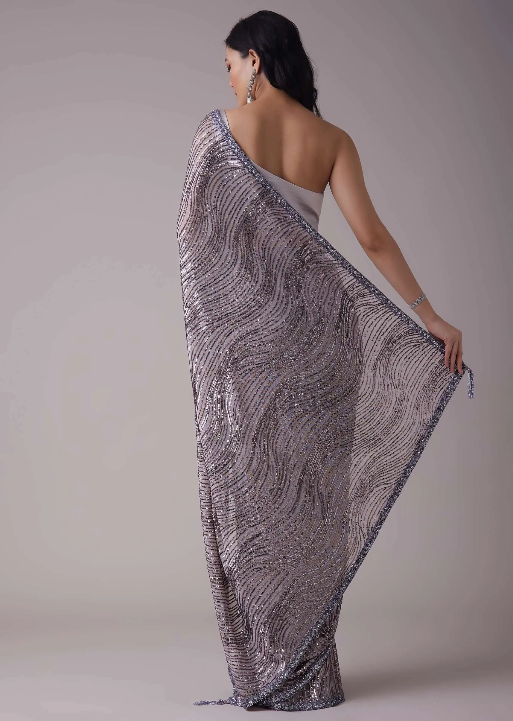 Lavender Purple Sequins Saree With An Embellished Border