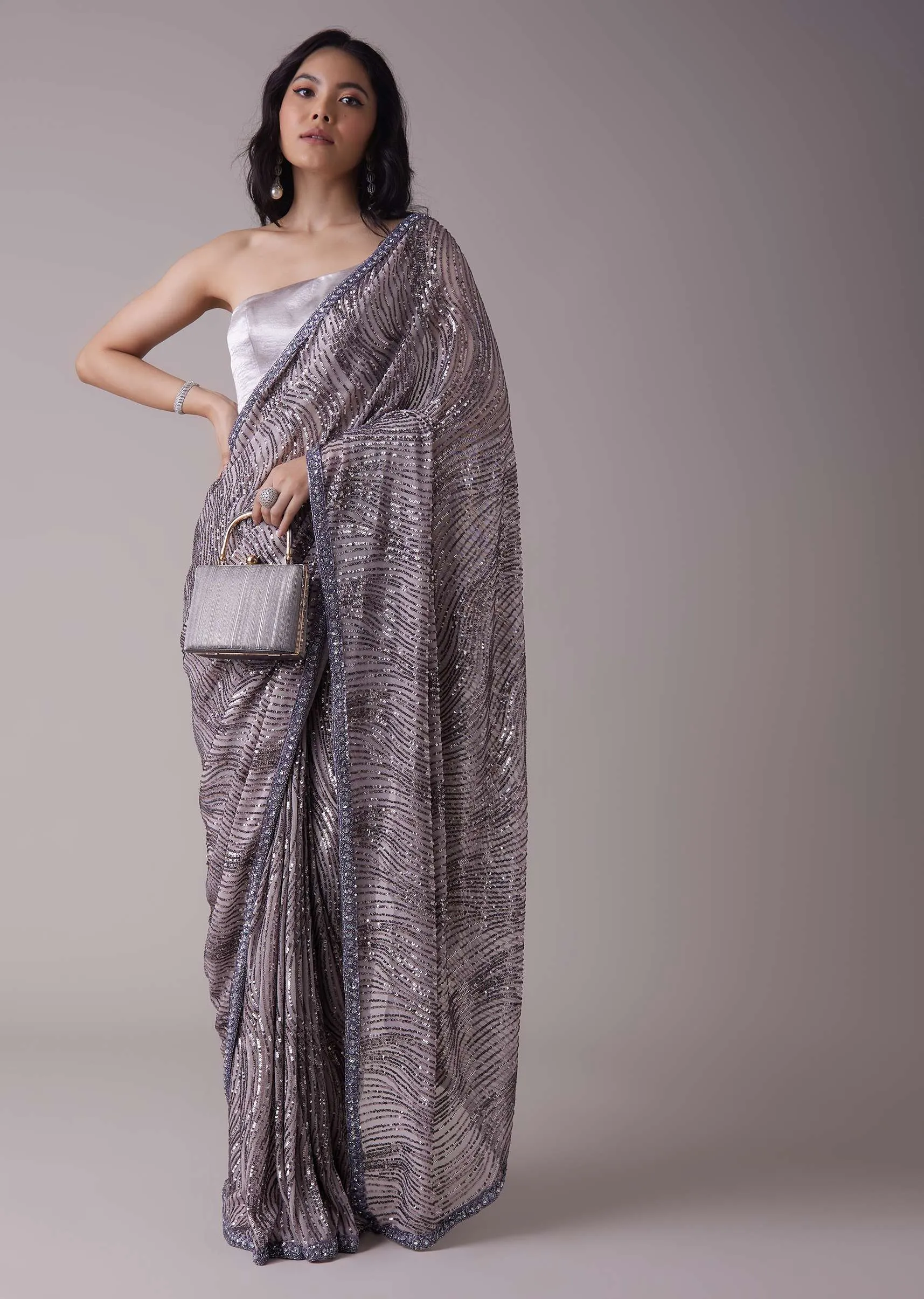 Lavender Purple Sequins Saree With An Embellished Border