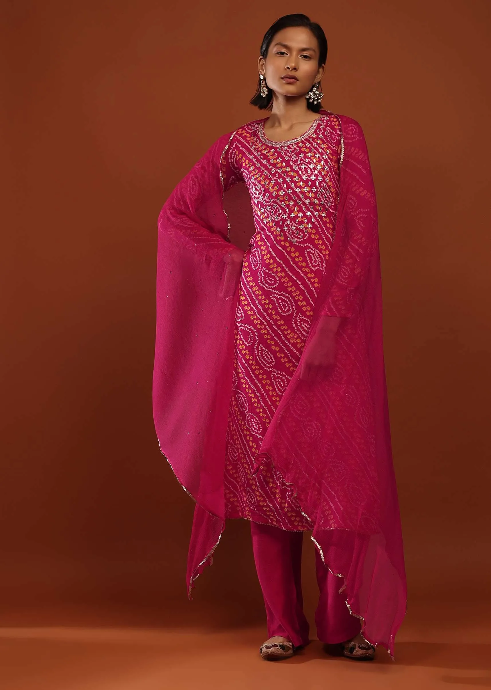 Magenta Pink Suit In Georgette With Bandhani Print And Gotta Embroidered Yoke