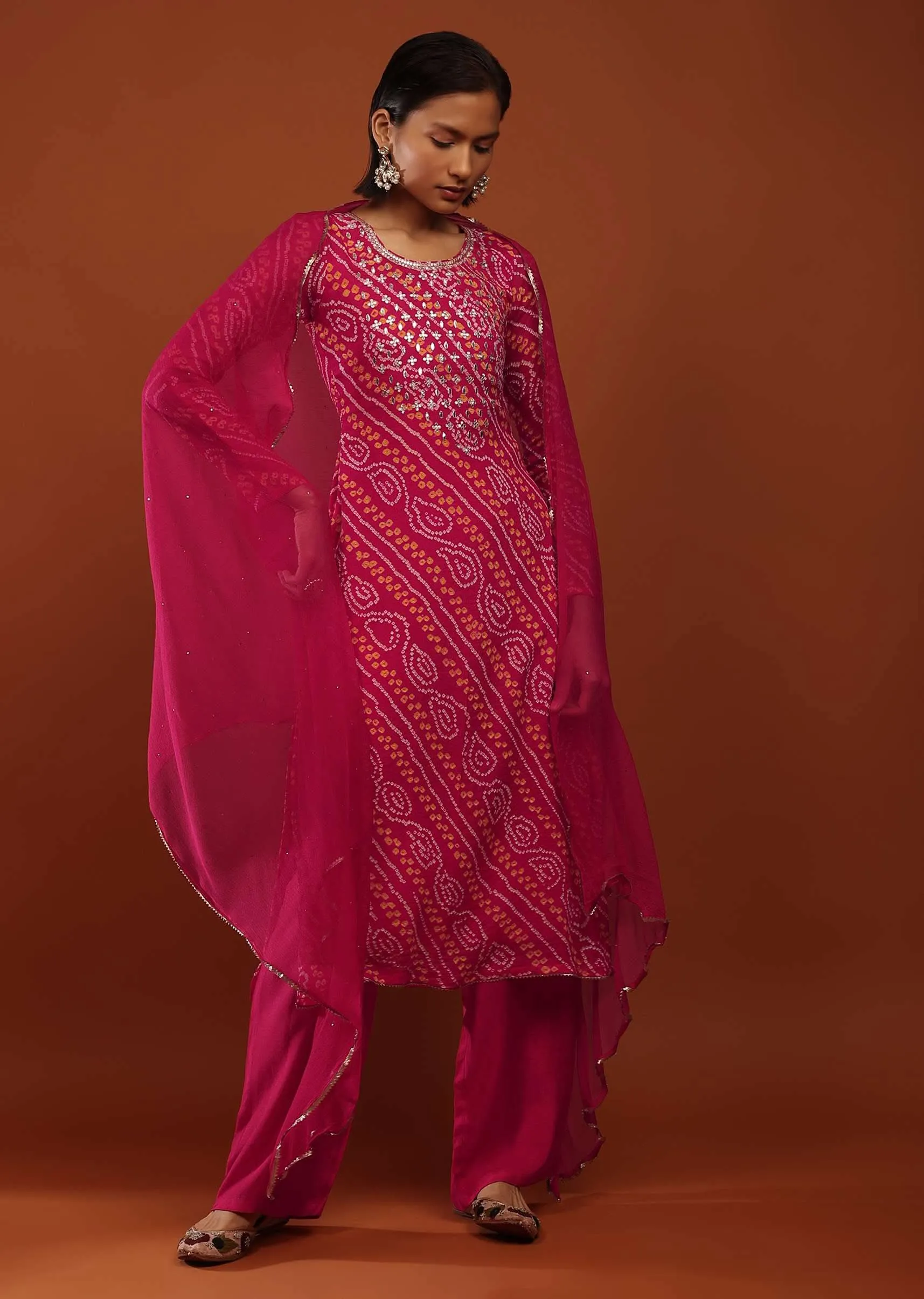 Magenta Pink Suit In Georgette With Bandhani Print And Gotta Embroidered Yoke
